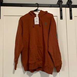 Brand new burnt orange Ariat sweatshirt